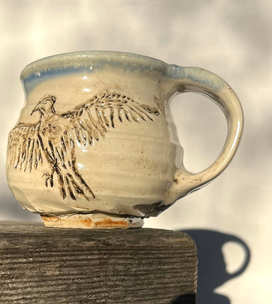 Storytelling Mug: Carved Hawk Taking Flight to the Sun